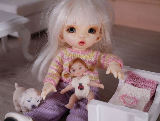 "...but I´ve got to put Dollie to bed!"