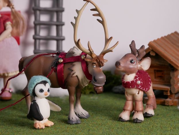 Rudolph admires Svens antlers.