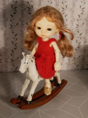 Frida loves her rocking horse