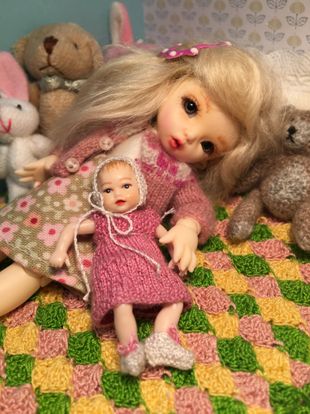 Nap time for little dolls and dollies